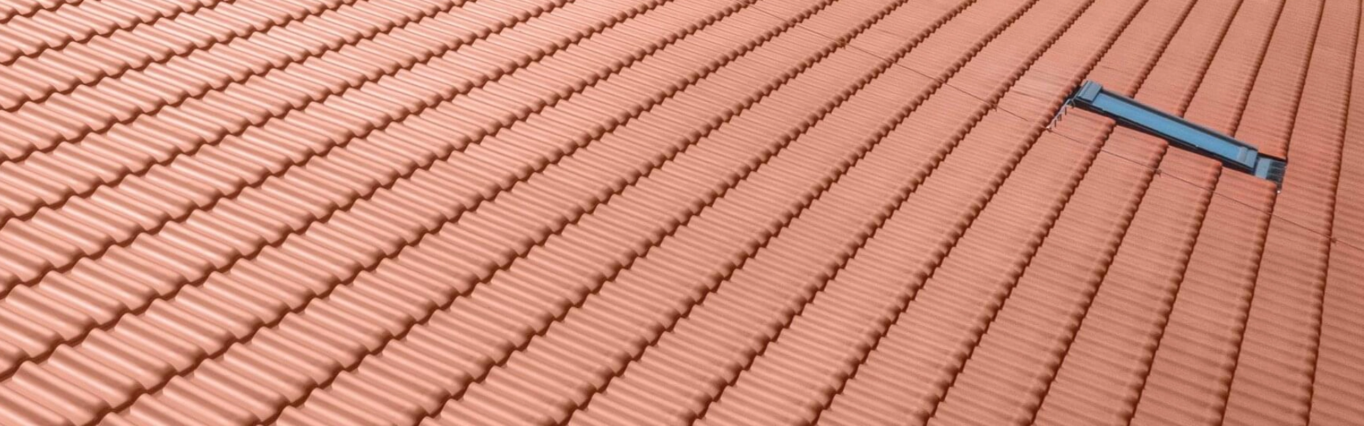 Erlus E58 Clay Low Pitch Pantile roof in red